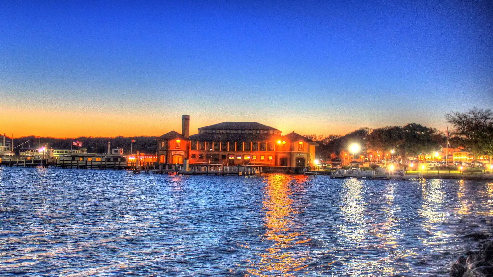 Lake Geneva waterfront and boat docks at dusk